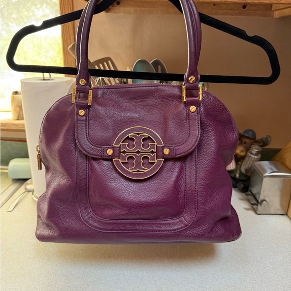 Tory Burch Handbags - Tory Burch Purple and Gold Shoulder Bag with Logo Medallion
